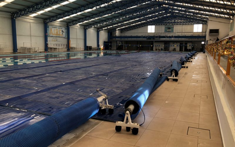 Alberca olímpica con plaza comercial y salon de fiestas